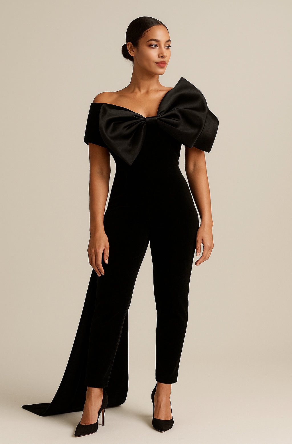 Eleganza Iconica – Tuta da Sera con Fiocco Oversize